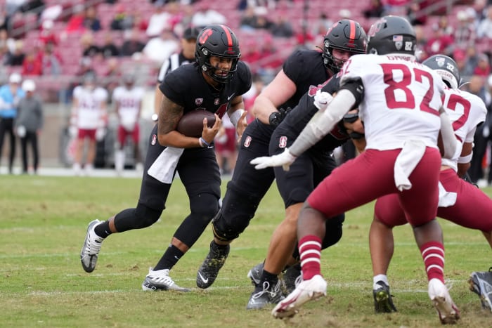 Nov 5, 2022; Stanford, California, USA; Stanford Cardinal quarterback Ashton Daniels (14) rushes for a touchdown against the Washington State Cougars during the third quarter at Stanford Stadium. Mandatory Credit: Darren Yamashita-USA TODAY Sports